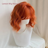 Short Wavy Orange Wig with Bangs 12inch Curly Hair Lolita High Quality Synthetic Wigs for Women Daily Cosplay Wig Heat Resistant Khamik Shop Online