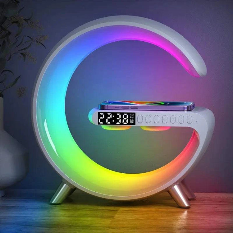 Chargeur sans fil multifonction avec horloge, réveil, enceinte Bluetooth et contrôle via application.