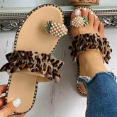 Paire de sandales plates femmes style palmes d&
