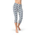 Leggings capri femmes bleu motif géométrique, confort et performance, tissu extensible et respirant.
