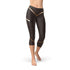 Leggings capri femme marron à rayures pour sport, confort et haute performance.